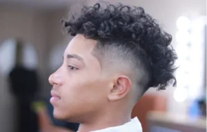Mid Skin Fade with Curly Top
