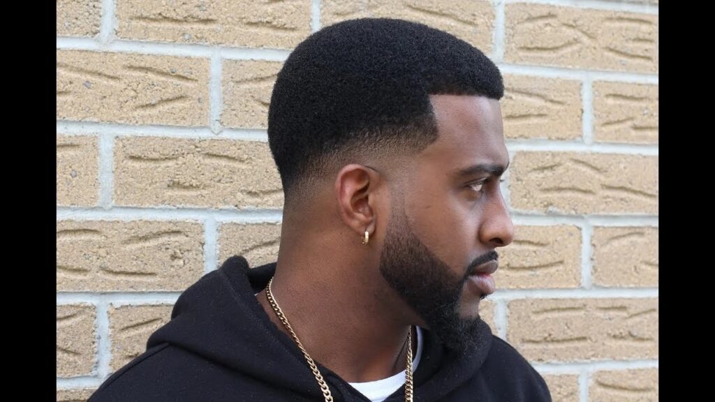 12. Low Fade with Slick Back