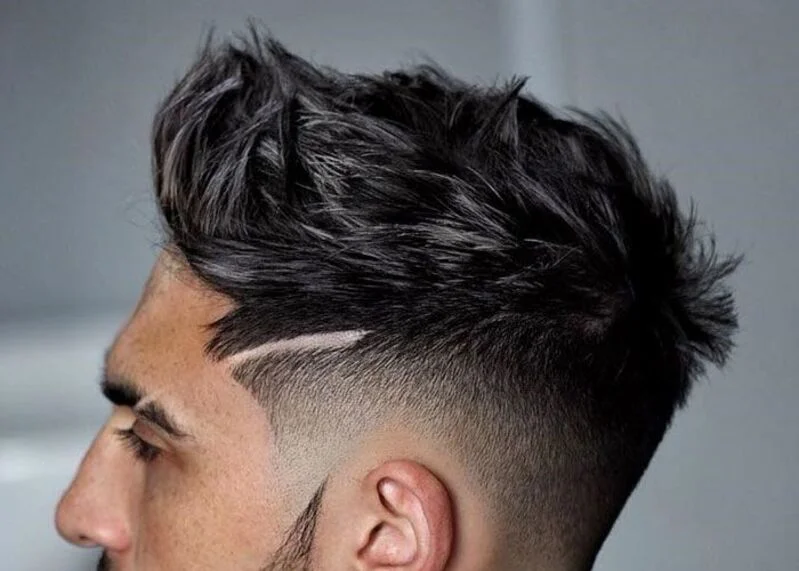 Men’s spiky hairstyle with defined spikes and clean finish – 2025 trend.