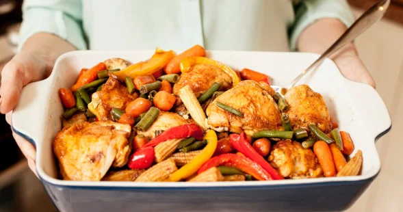 High angle of woman holding food for dinner