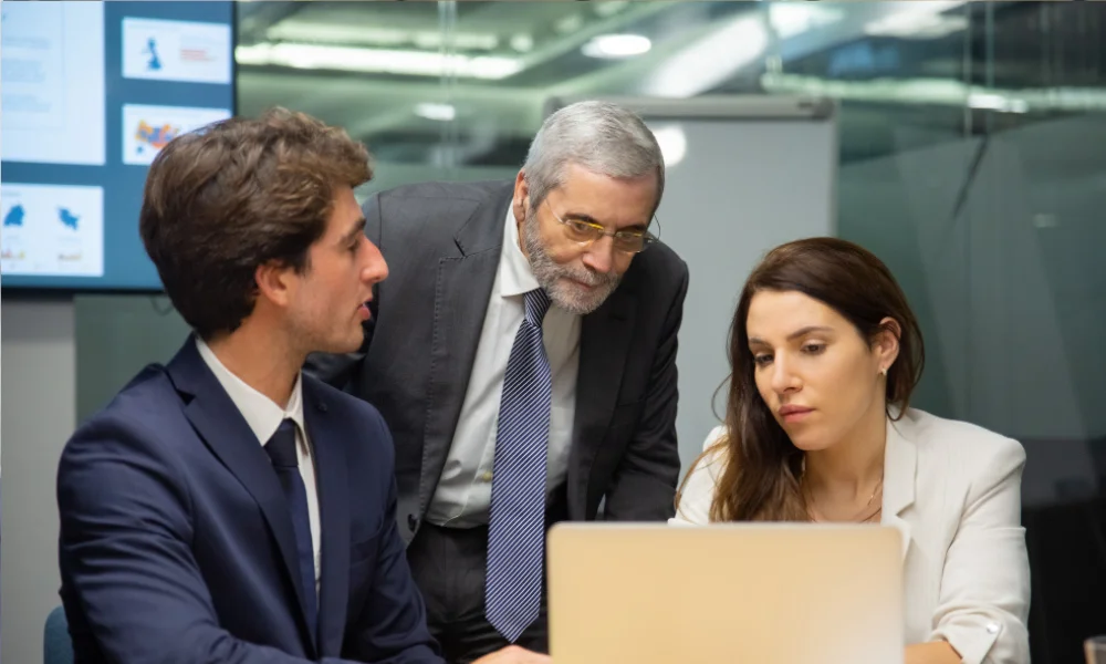 Business team in meeting discussing website trust and Google rankings