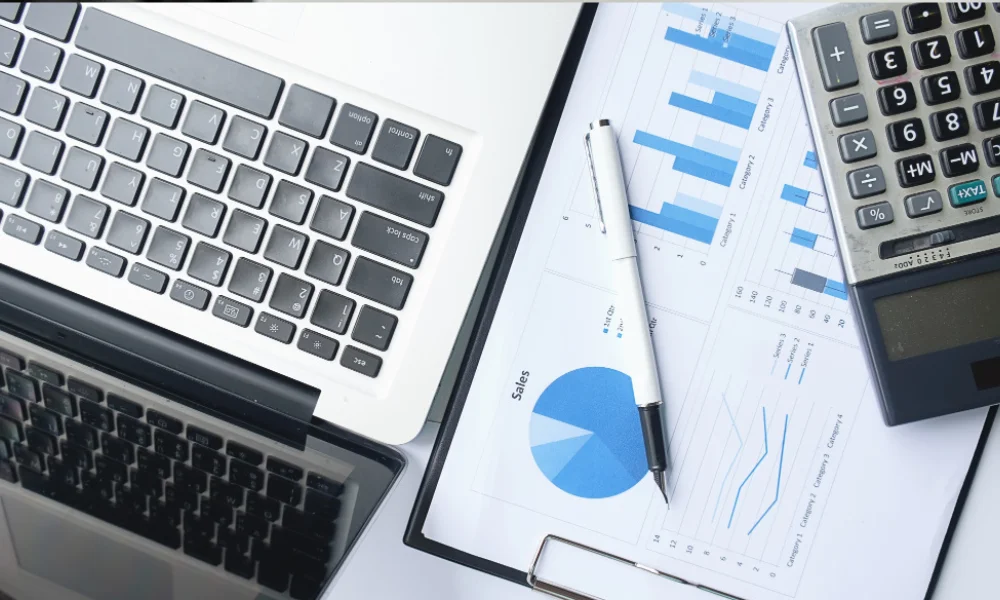 Calculator and financial reports on a desk