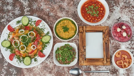 Vegetable salad soup cups on the table.-cheap vegetarian meal ideas
