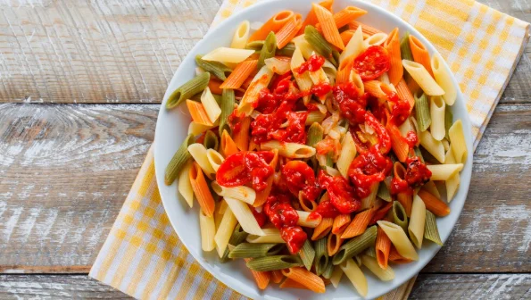 Penne pasta with tomato, sauce in a plate