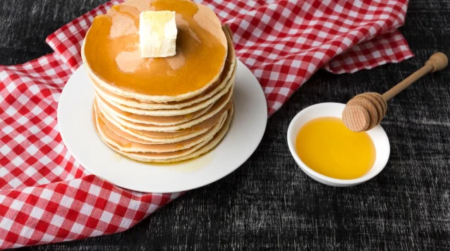 High angle of pancakes with syrup-best brunch menu