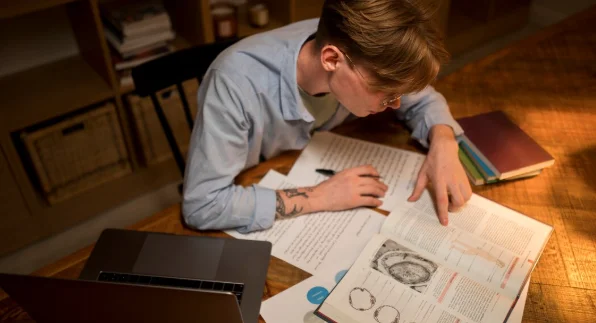 Young man learning in a virtual classroom