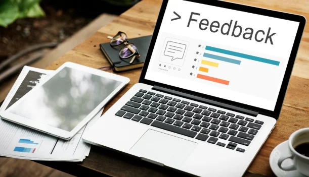 Laptop showing feedback report-Best Job Interview Questions to Ask