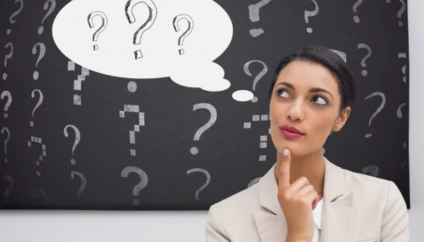 Woman thinking with question marks-Best Job Interview Questions to Ask