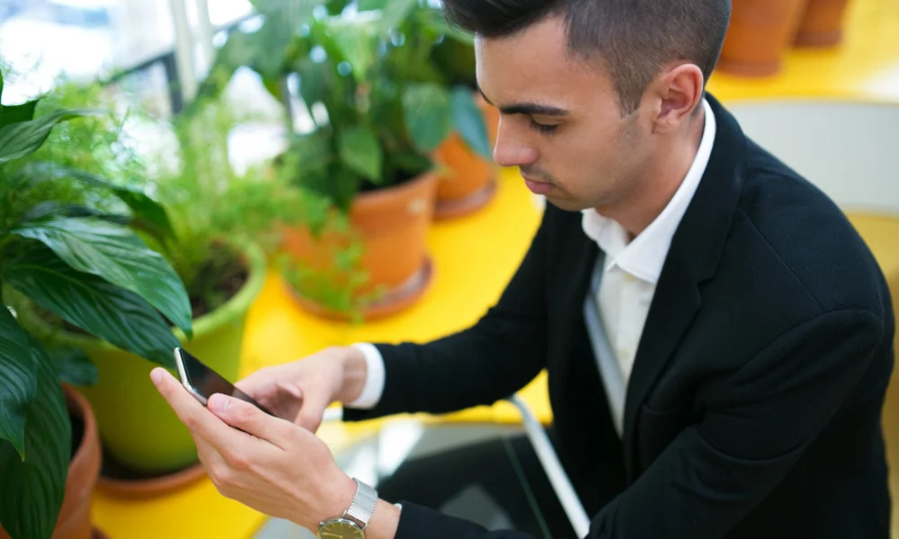 SEO professional managing Google Business Profile on a smartphone