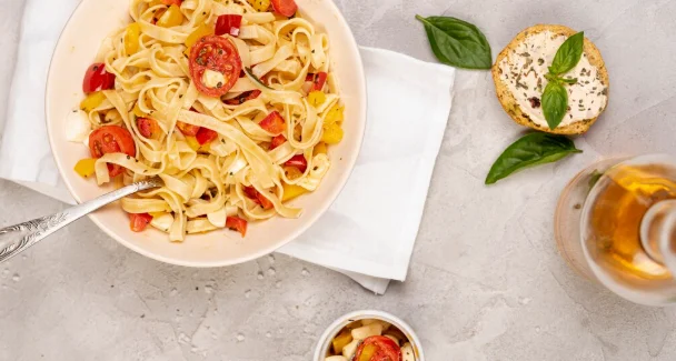 Flat lay of delicious italian food on plain background-cheap family dinner recipes