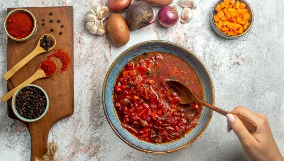 delicious borsch ukranian beet soup with seasonings on white space