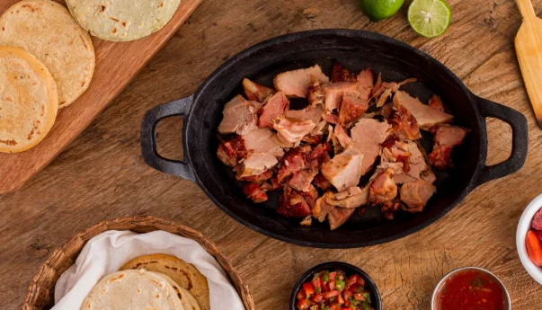 view of pot with arepas filling and sauce-cheap slow cooker recipes