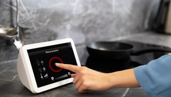 Close up finger using device-crock pot pressure cooker