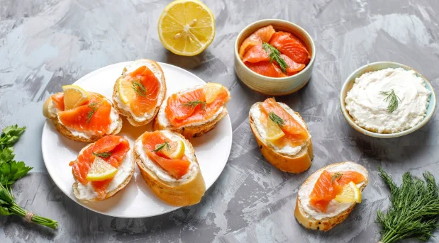 Sandwiches with smoked salmon and cream cheese and dill