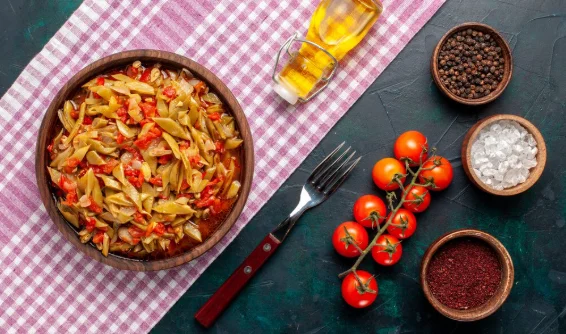 Top view sliced vegetable meal with different ingredients on dark-blue desk-cheap pasta dishes