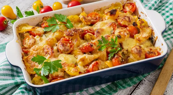 Vegetarian vegetable casserole with zucchini, mushrooms and cherry tomatoes