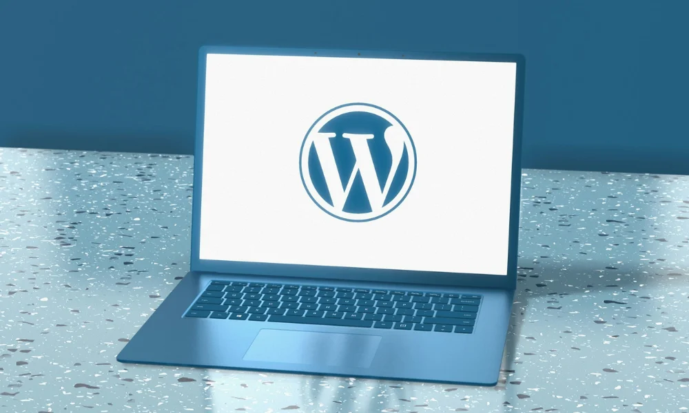 WordPress logo on laptop screen.