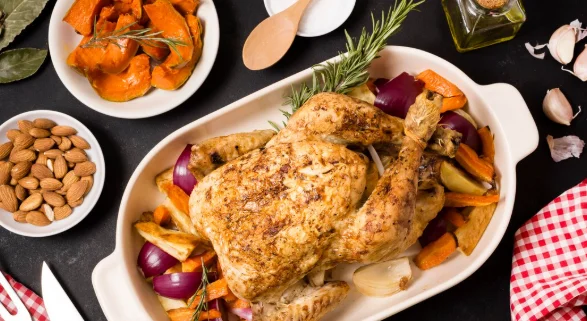 Flat lay of thanksgiving table with roasted chicken dish-slow cooker meals for two