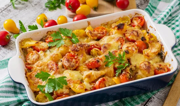 Vegetarian vegetable casserole with zucchini, mushrooms and cherry tomatoes
