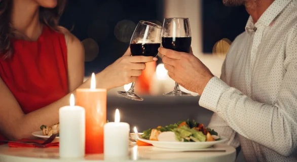 Couple of lovers having romantic dinner at home