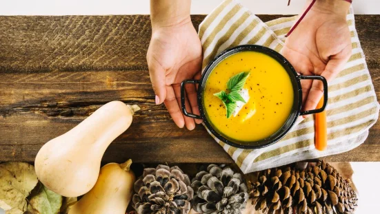Hand holding soup-easy family dinners