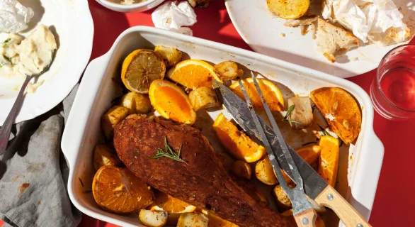 Delicious chicken and plates filled with leftovers-family meals