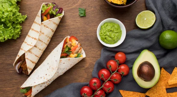 Top view delicious mexican food with guacamole-quick dinner ideas for family