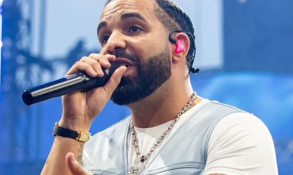 Hip-hop artist Drake performing live during a concert for drake wealth in 2026.