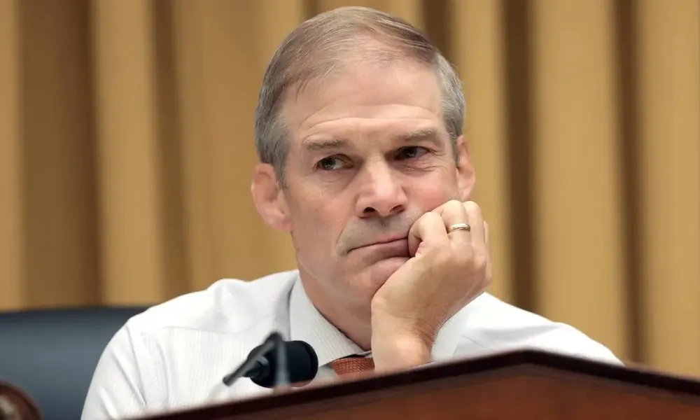 Jim Jordan wealth net worth 2026 overview featuring U.S. Representative Jim Jordan resting his chin on his hand during a congressional hearing.