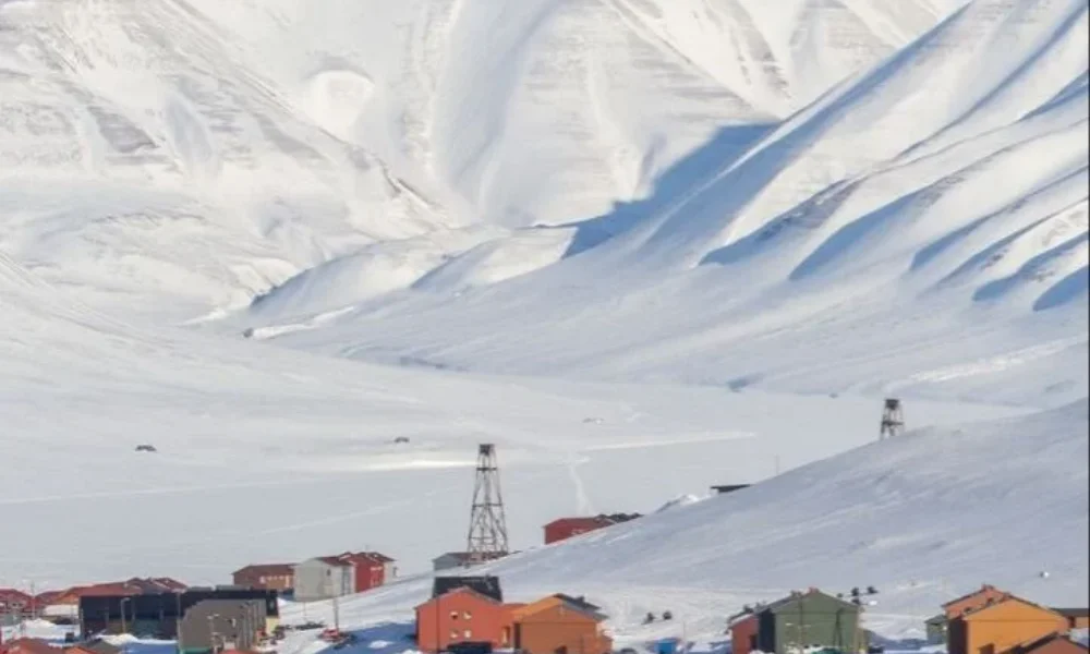  Arctic valley town with snowy mountains in Svalbard for Most Exclusive Travel Destinations. 