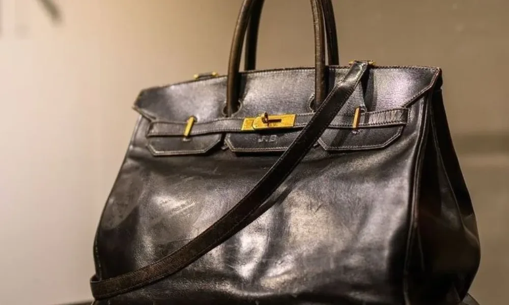 Original black leather Hermès Birkin bag on display, among the most expensive handbags. 