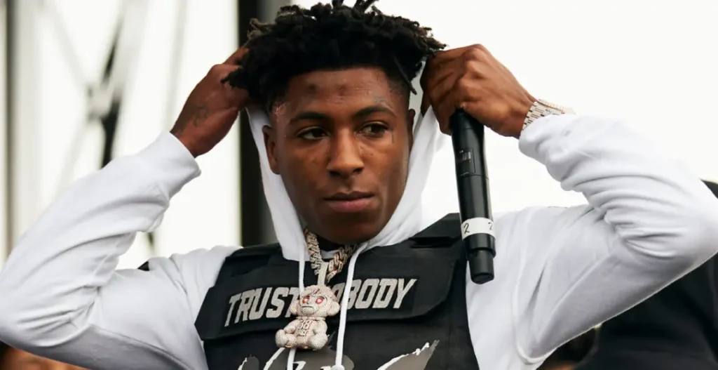NBA YoungBoy poses thoughtfully in his first Instagram photo after being released from prison, signaling his return to music.
