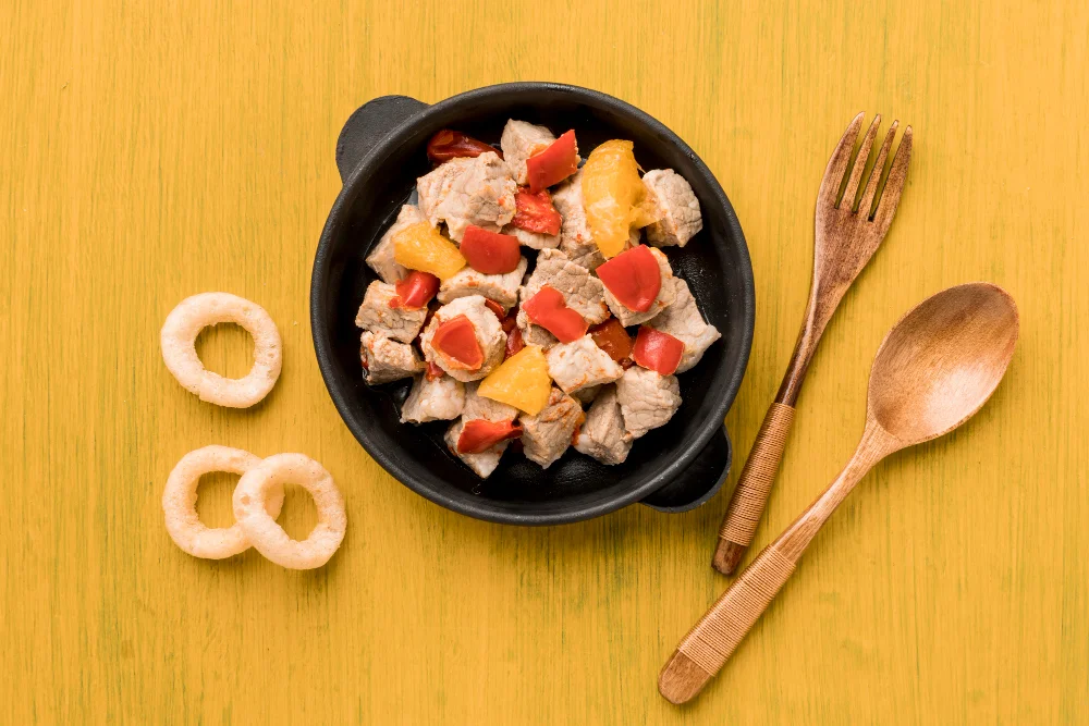 Top view meat and vegetables dish