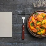 tasty meat soup with greens and potatoes