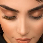 Woman with natural eyelash extensions close-up