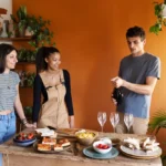 Medium shot friends with delicious food indoors