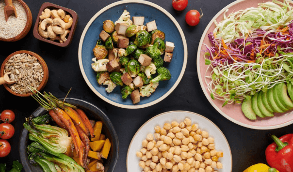 Top view food arrangement on wooden background