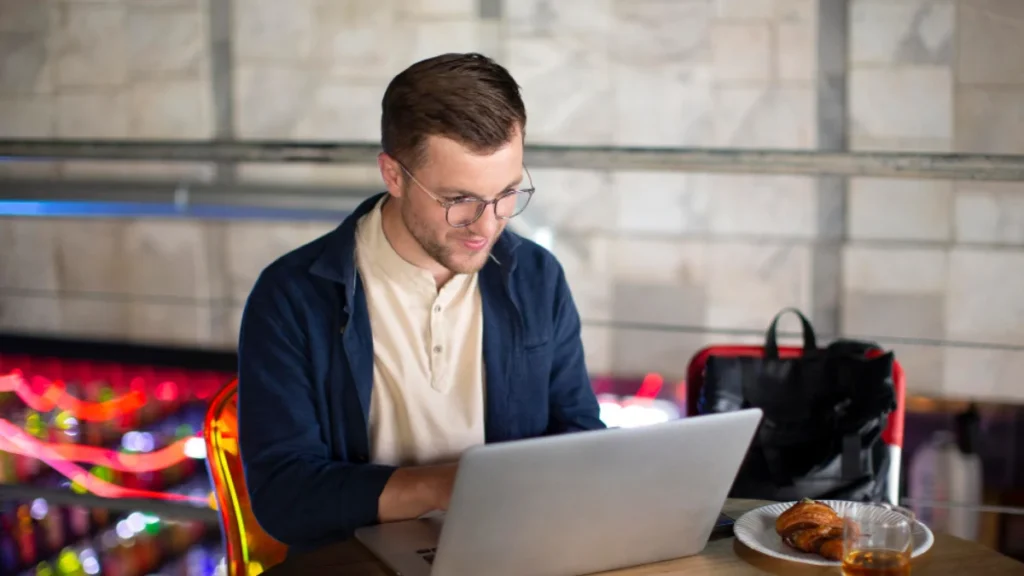 SEO specialist working on website optimisation on laptop