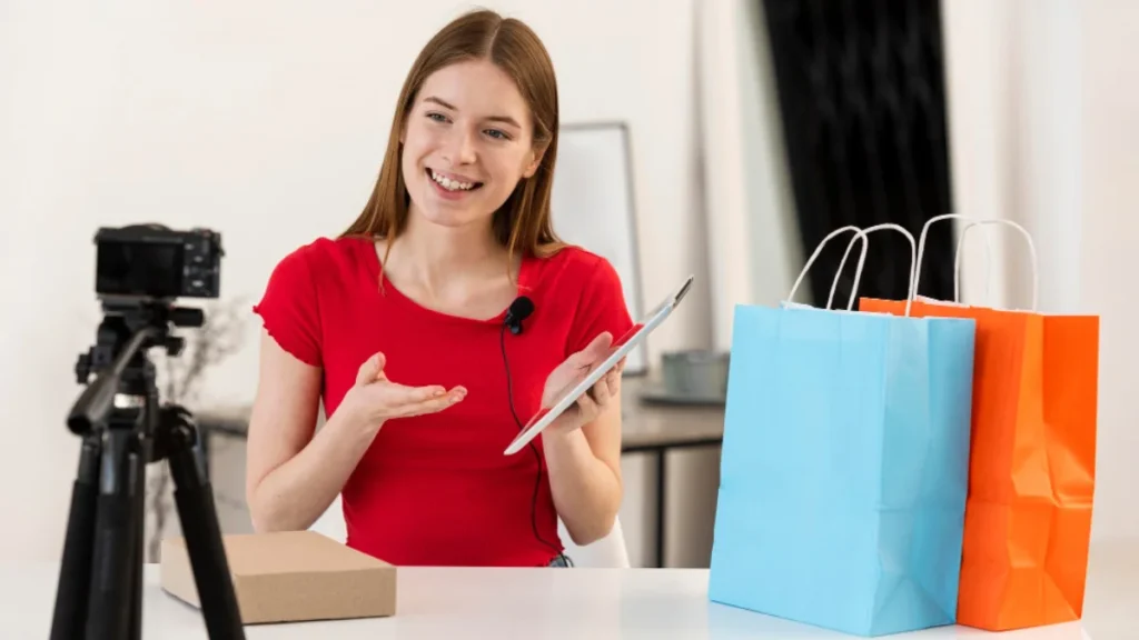 Influencer promoting Target affiliate products while recording video with shopping bags.