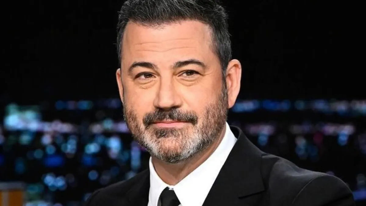 jimmy Kimmel late-night talk show desk photo for Jimmy Kimmel Net Worth.