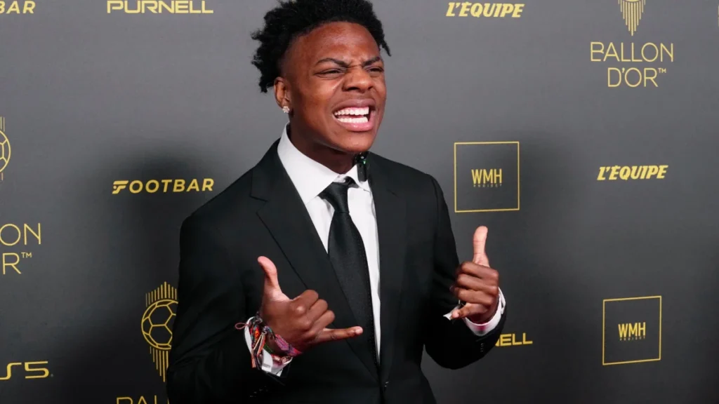 YouTuber and streamer IShowSpeed posing in a suit on the red carpet at the Ballon d'Or ceremony.