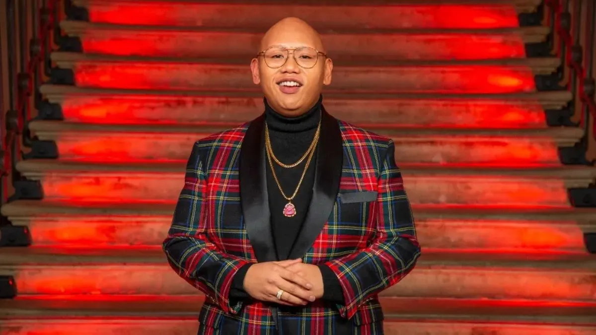 Jacob Batalon poses at a Netflix premiere event, illustrating his prominent acting career and expanding Jacob Batalon net worth.